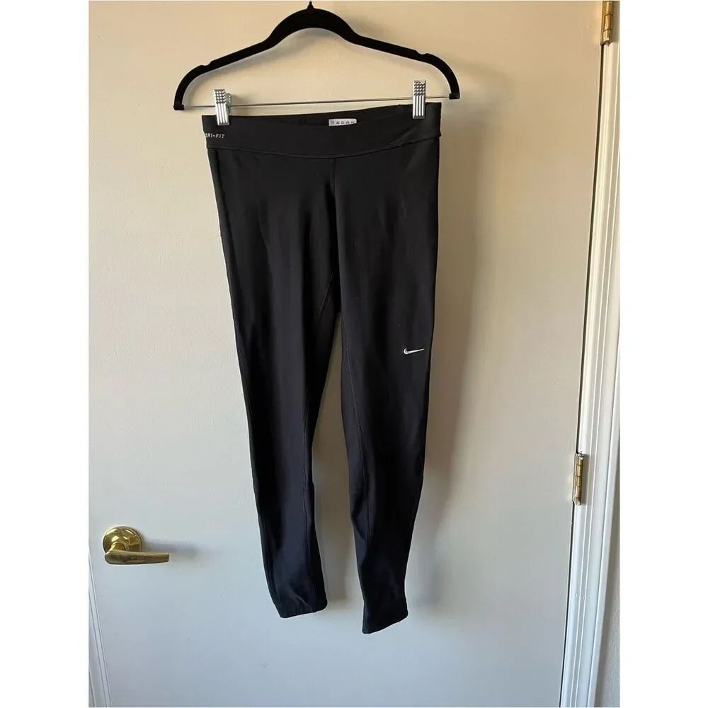 Nike Black Dri-FIT leggings with White Swoosh